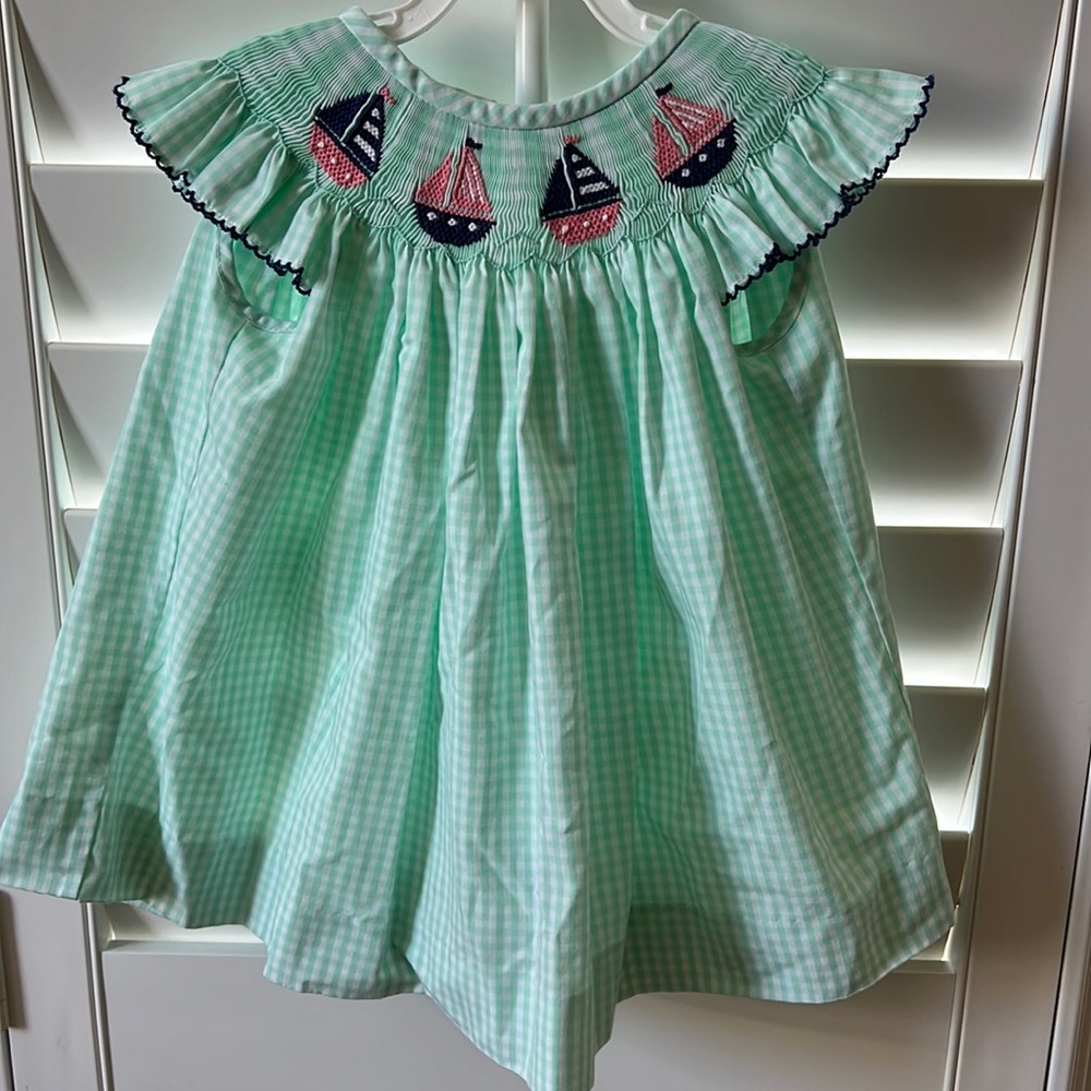 Green and white checked sailboat smocked dress